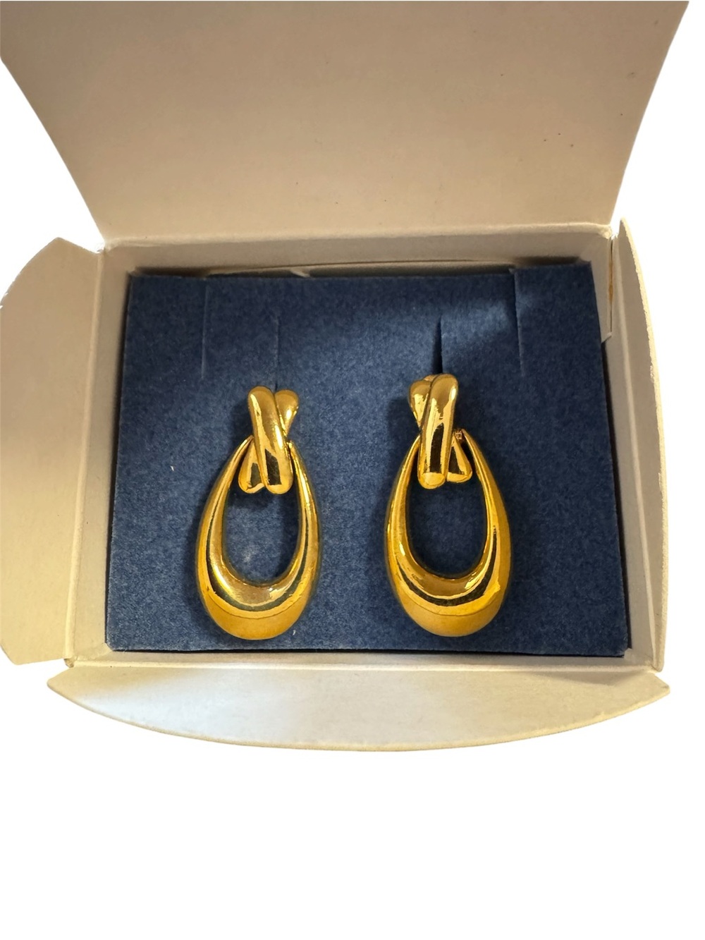 Avon Gold Teardrop Loop Earrings forms an X and an O